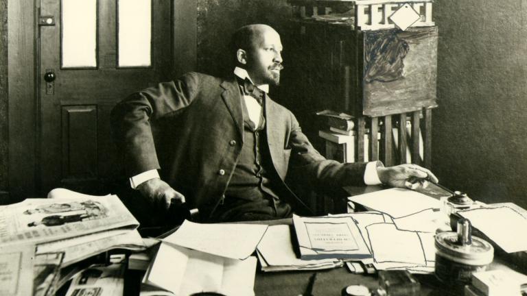 W.E.B. Du Bois seated at desk in office at Atlanta University, 1909. (Special Collections and University Archives, University of Massachusetts Amherst Libraries)