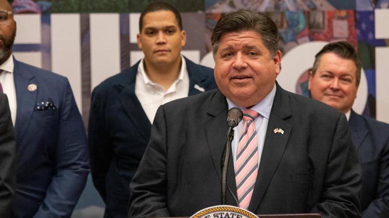Gov. J.B. Pritzker speaks to reporters at a news conference celebrating the continued recovery of the tourism industry on July 10, 2023. (Andrew Adams / Capitol News Illinois)