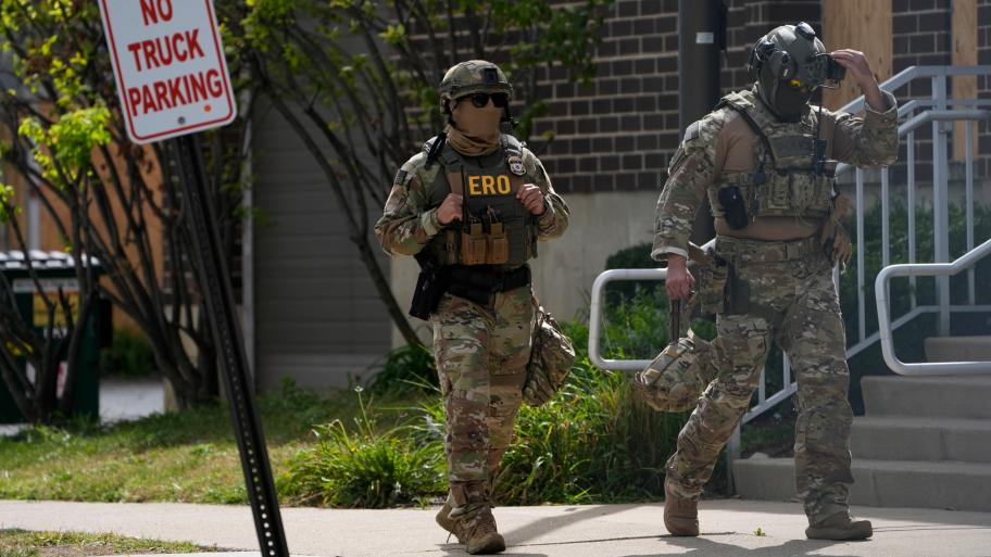 Enforcement and Removal Operations agents walk outside the U.S. Immigration and Customs Enforcement (ICE) building Wednesday, Sept. 24, 2025, in Broadview, Ill. (AP Photo/Erin Hooley)