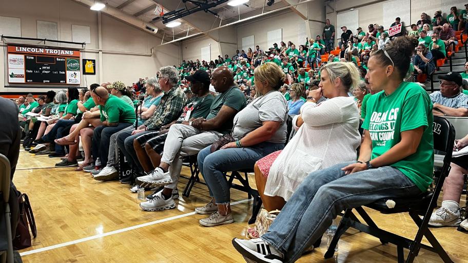 Hundreds of prison employees and community members attend a legislative hearing in Lincoln on Thursday, June 13, 2024, where the closure and potential relocation of Logan Correctional Center 140 miles northeast to the Chicagoland area was hotly contested. (Hannah Meisel / Capitol News Illinois)