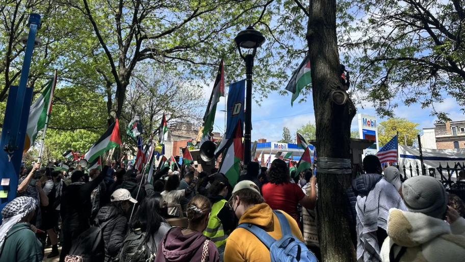 Students at DePaul University’s Gaza Solidarity Encampment face counterprotesters in May 2024. This encampment was one of at least 130 similar campus protests last year, which highlighted concerns that Israel was engaging in human rights violations. (Simon Carr / Medill Illinois News Bureau)