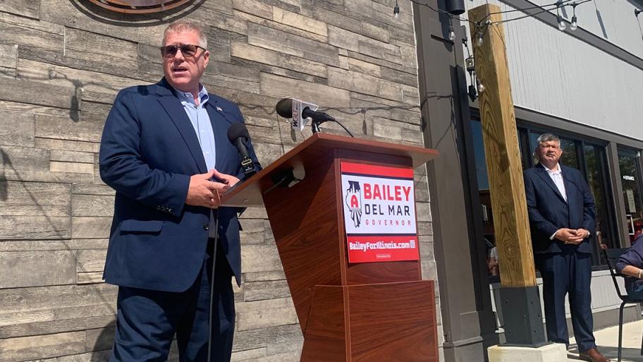 Former Republican State Sen. Darren Bailey speaks to supporters at a rally in Bloomington to open his 2026 campaign for governor on Thursday, Sept. 25, 2025. Bailey named Cook County Republican Party Chair Aaron Del Mar, right, as his running mate. (Ben Szalinski / Capitol News Illinois)
