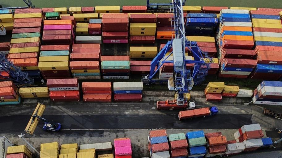 Containers are piled up in a cargo terminal in Frankfurt, Germany, Friday, Aug. 1, 2025. (AP Photo / Michael Probst)