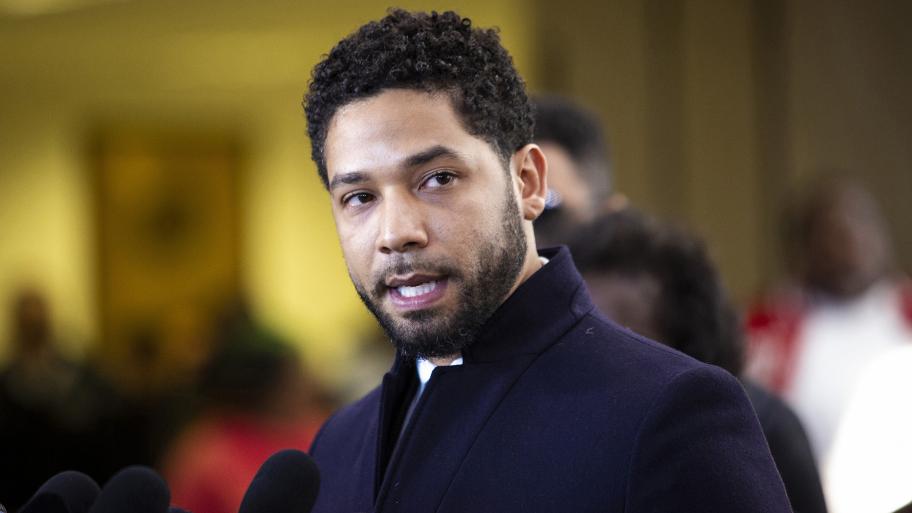 Actor Jussie Smollett leaves the Leighton Criminal Courthouse in Chicago on Tuesday March 26, 2019, after prosecutors dropped all charges against him. (Ashlee Rezin / Chicago Sun-Times via AP)