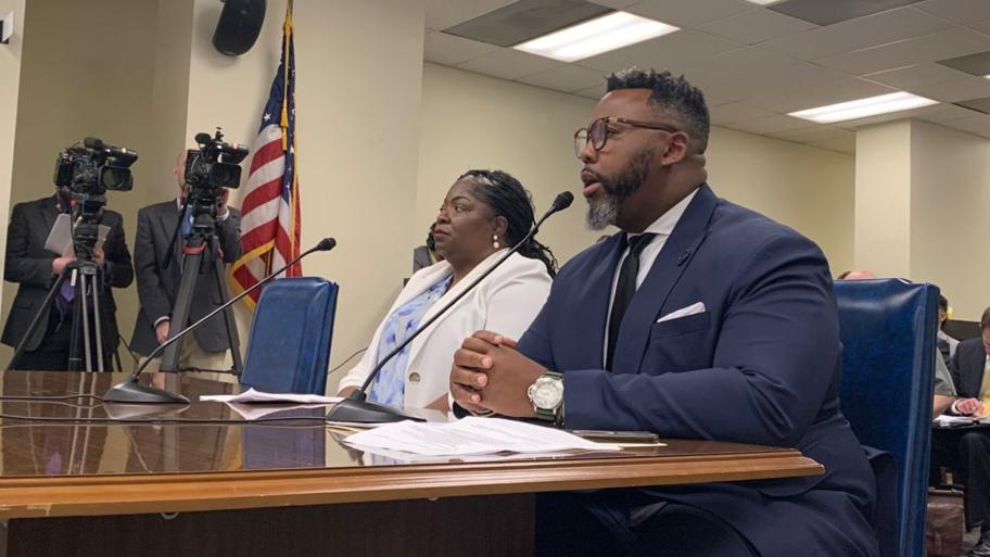 State Rep. Kam Buckner (D-Chicago), right, presents a bill in the House Judiciary Criminal Committee on Tuesday, March 18, 2025, alongside Anjanette Young. (Ben Szalinski / Capitol News Illinois)