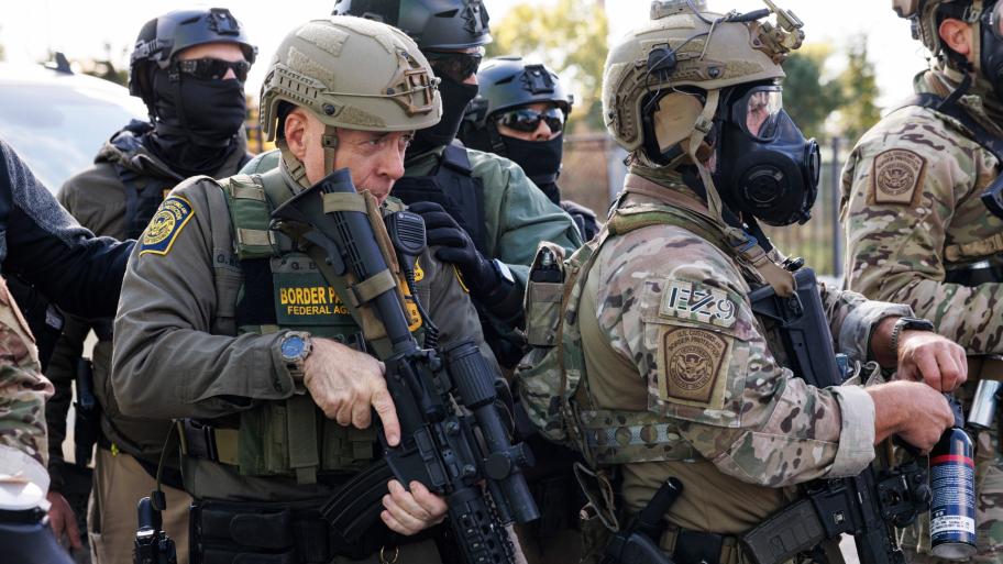 U.S. Border Patrol Commander-At-Large Gregory Bovino stands with federal immigration enforcement agents during a skirmish with protesters in Little Village neighborhood, Chicago Thursday, Oct. 23, 2025. (Anthony Vazquez/Chicago Sun-Times via AP)