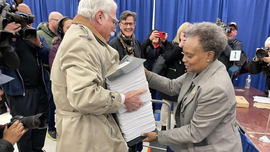 Mayor Lori Lightfoot prepares to file more than 40,000 signatures to make her bid for a second term official on Monday, Nov. 28, 2022. (Heather Cherone/WTTW)