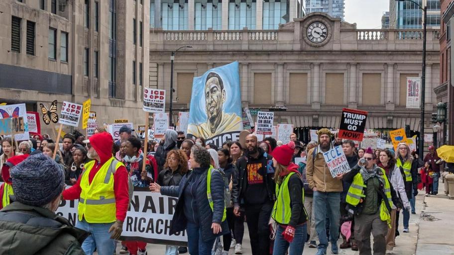 Demonstrators march through downtown Chicago after a rally in Union Park to mark May Day on May 1, 2026. (Matt Masterson / WTTW News)