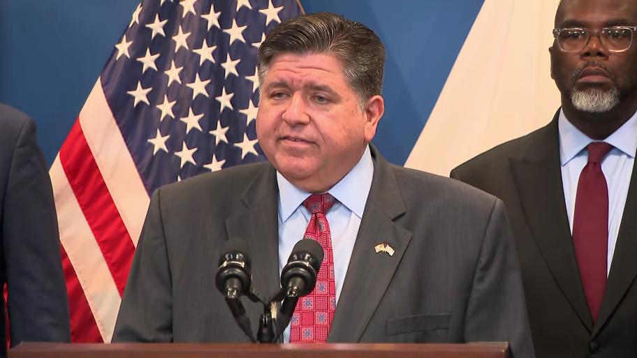 Gov. JB Pritzker addresses the news media on Monday, Oct. 6, 2025, as Mayor Brandon Johnson looks on. (WTTW News)
