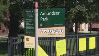 Signs outside the Amundsen Park field house. (WTTW News)