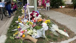A memorial for three-year-old Lily Shambrook at the Uptown intersection where she was killed by a driver while riding in a carrier on her mother’s bike is pictured on June 12, 2022. (Nick Blumberg / WTTW News)