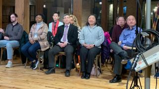 Bridgeport residents watch the WTTW News mayoral forum. (Eunice Alpasan)