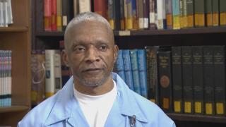 Darrell Fair, an inmate at Stateville Correctional Center who maintains his innocence after 25 years in prison, speaks with “Chicago Tonight.” (WTTW News)