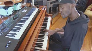 Isaiah Collier plays the piano. He will perform at the Englewood Jazz Festival. (WTTW News)