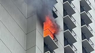 Flames can be seen pouring out of a high-rise building Wednesday at 1212 North Lake Shore Drive. (Chicago Fire Department)