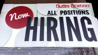 A hiring sign is displayed at a restaurant in Rolling Meadows, Ill., Tuesday, Dec. 27, 2022. On Wednesday, the Labor Department reports on job openings and labor turnover for November. (AP Photo / Nam Y. Huh, File)