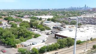 A photo inside the Environmental Defense Fund “Illinois Warehouse Boom” report shows an aerial view of Chicago’s Little Village neighborhood. A warehouse sits alongside a residential area. (Courtesy of Little Village Environmental Justice Organization) 