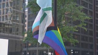 Raising of the progress pride flag at Daley Plaza for Pride Month on June 3, 2024. (WTTW News)