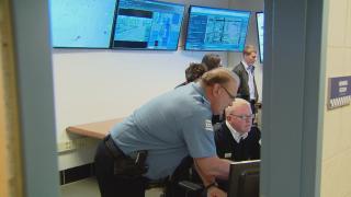 Chicago police officers use ShotSpotter technology. (WTTW News)