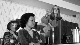 In this Nov. 21, 1979 file photo, Bella Abzug, left, and Patsy Mink of Women USA sit next to Gloria Steinem as she speaks in Washington where they warned presidential candidates that promises for women's rights will not be enough to get their support in the next election. (AP Photo / Harvey Georges, File)