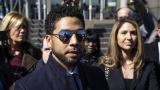 Actor Jussie Smollett leaves the Leighton Criminal Courthouse in Chicago on Tuesday March 26, 2019, after prosecutors dropped all charges against him. (Ashlee Rezin / Chicago Sun-Times via AP)