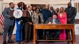 Gov. JB Pritzker signs a bill designating July 25, 2026, as Emmett Till Day in Illinois. (Photo courtesy state of Illinois)