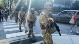 Federal agents patrol downtown Chicago, Sunday, Sept. 28, 2025. (AP Photo / Sophia Tareen)