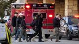 Police officials walk to the Mayfair Mall, Friday, Nov. 20, 2020, in Wauwatosa, Wis. (AP Photo / Nam Y. Huh)