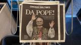 Chicago Sun Times newspaper front page showing Pope Leo XIV is seen on a newspaper rack at a store, Friday, May 9, 2025, in Chicago. (AP Photo / Melina Walling)