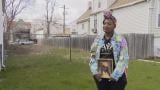 Nyisha Beemon holds a photo of her daughter, Jaya Beemon, who was shot and killed in February 2020. She has since started a foundation in her name. (WTTW News)