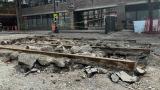 Exposed streetcar rails are a blast from Chicago's transit past. Seen in the 4600 block of North Lincoln Avenue in the Lincoln Square neighborhood. (Patty Wetli / WTTW News)