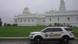 A security vehicle is parked outside of Sri Venkateswara Swami (Balaji) Temple in Aurora, Ill., Thursday, Oct. 15, 2026. (AP Photo / Laura Bargfeld)