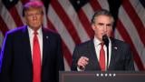 Republican presidential candidate former President Donald Trump listens as North Dakota Gov. Doug Burgum speaks at a caucus night rally in Las Vegas, Feb. 8, 2024. (AP Photo / Mark J. Terrill, File)