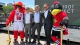 From left, Benny the Bull, Chicago Bulls President and CEO Michael Reinsdorf, United Center CEO Terry Savarise, Chicago Blackhawks Chairman and CEO Danny Wirtz and Tommy Hawk during a groundbreaking event for the 1901 Project at the United Center on June 3, 2026. (Eunice Alpasan / WTTW News)