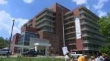 People rally outside of Weiss Memorial Hospital in Uptown on Friday, Aug. 8, 2025. (WTTW News)