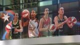 A banner at Wintrust Arena ahead of the 2026 WNBA All-Star Weekend. (WTTW News)