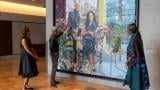 Former President Barack Obama and former first lady Michelle Obama view their portrait by artist Njideka Akunyili Crosby in the Obama Presidential Center Museum's Hope and Change Lobby on June 14, 2026. (Courtesy of The Obama Foundation)