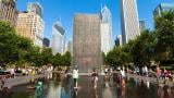 A file photo of people at the Crown Fountain in Millennium Park on a hot summer day. (RAUL RODRIGUEZ / iStock)