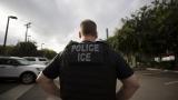 In this July 8, 2019, file photo, a U.S. Immigration and Customs Enforcement officer looks on during an operation in Escondido, California. (AP Photo / Gregory Bull, File) In this July 8, 2019, file photo, a U.S. Immigration and Customs Enforcement officer looks on during an operation in Escondido, California. (AP Photo / Gregory Bull, File)