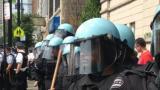 Police presence increasing around black bloc on May 20, screams of "f*** the police"/Michell Eloy