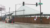 Work is underway at a base camp for migrants in Brighton Park on Dec. 1, 2023. (WTTW News) Work is underway at a base camp for migrants in Brighton Park on Dec. 1, 2023. (WTTW News)