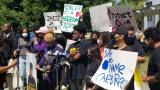 Family and friends of teen activist Caleb Reed gather outside Mather High School Tuesday, Aug. 4, 2020. Reed, 17, died Sunday after he was shot days earlier. (Matt Masterson / WTTW News) Family and friends of teen activist Caleb Reed gather outside Mather High School Tuesday, Aug. 4, 2020. Reed, 17, died Sunday after he was shot days earlier. (Matt Masterson / WTTW News)
