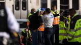 Chicago Fire Department and Chicago Police Department personnel triage patients at the scene after a Chicago Transit Authority train crashed into a piece of equipment that was on the rails near the Howard CTA station on the North Side, Thursday, Nov. 16, 2023 in Chicago. (Ashlee Rezin /Chicago Sun-Times via AP) Chicago Fire Department and Chicago Police Department personnel triage patients at the scene after a Chicago Transit Authority train crashed into a piece of equipment that was on the rails near the Howard CTA station on the North Side, Thursday, Nov. 16, 2023 in Chicago. (Ashlee Rezin /Chicago Sun-Times via AP)