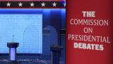 Clear protective panels stand onstage between lecterns as preparations take place for the second Presidential debate at Belmont University, Oct. 21, 2020, in Nashville, Tenn. (AP Photo / Patrick Semansky, File) Clear protective panels stand onstage between lecterns as preparations take place for the second Presidential debate at Belmont University, Oct. 21, 2020, in Nashville, Tenn. (AP Photo / Patrick Semansky, File)