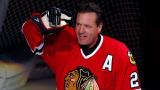 Former Chicago Blackhawks player Jeremy Roenick acknowledges the crowd after being honored before an NHL hockey game between the Vancouver Canucks and the Blackhawks, Sunday, Jan. 22, 2017, in Chicago. (AP Photo / Nam Y. Huh)