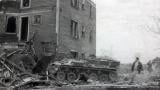 In this still frame from circa 1961 WJAR-TV newsreel footage, provided by the Rhode Island Historical Society, an armored military vehicle is used to demolish a residential building in what was then known as the Lippitt Hill neighborhood, in Providence, R.I. (WJAR-TV / Rhode Island Historical Society via AP)