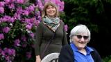 Jessie Cornwell, a resident of the Ida Culver House Ravenna, right, poses for a photo with the Rev. Jane Pauw, in Seattle on May 21, 2020. Cornwell tested positive for the coronavirus but never became ill, and may have been infectious when she shared a ride to Bible study with Pauw, who later got sick with COVID-19. (AP Photo / Elaine Thompson) Jessie Cornwell, a resident of the Ida Culver House Ravenna, right, poses for a photo with the Rev. Jane Pauw, in Seattle on May 21, 2020. Cornwell tested positive for the coronavirus but never became ill, and may have been infectious when she shared a ride to Bible study with Pauw, who later got sick with COVID-19. (AP Photo / Elaine Thompson)