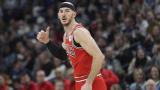 Chicago Bulls guard Alex Caruso gestures after making a 3-point shot during the first half of an NBA basketball game against the Minnesota Timberwolves, March 31, 2024, in Minneapolis. (AP Photo / Abbie Parr, file)