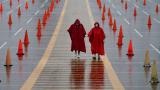 In this Aug. 29, 2020, file photo, fans walk through a parking lot at Arrowhead Stadium marked with traffic cones to keep fans from parking too close together during NFL football training camp for the Kansas City Chiefs in Kansas City, Mo. (AP Photo / Charlie Riedel, File) In this Aug. 29, 2020, file photo, fans walk through a parking lot at Arrowhead Stadium marked with traffic cones to keep fans from parking too close together during NFL football training camp for the Kansas City Chiefs in Kansas City, Mo. (AP Photo / Charlie Riedel, File)
