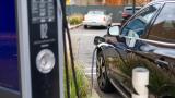 An electric vehicle is pictured charging in Chicago. (Andrew Adams / Capitol News Illinois)